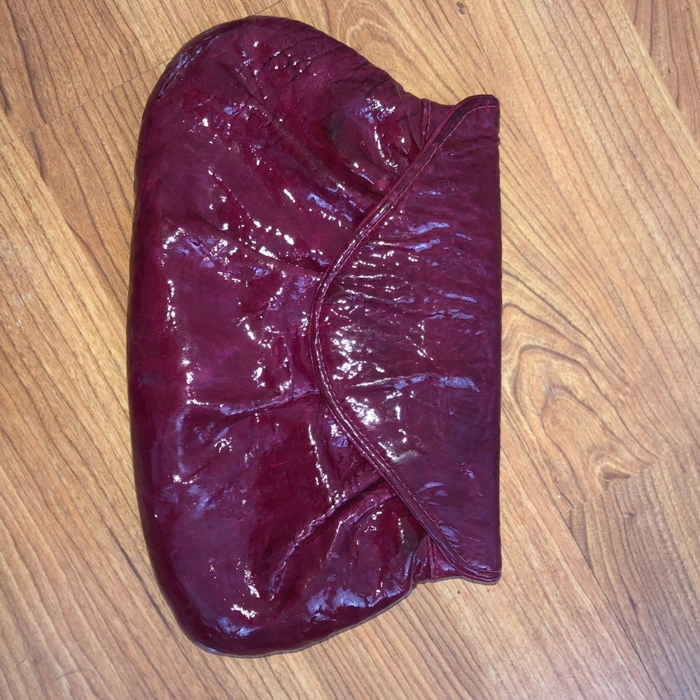 Embossed pink Lauren Merkin clutch